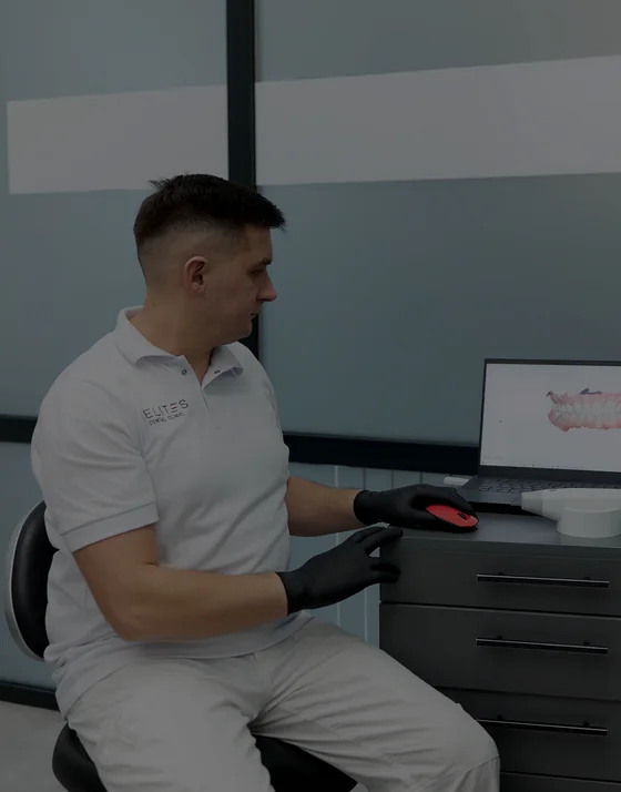 An ELITES doctor working with a Primescan digital scanner